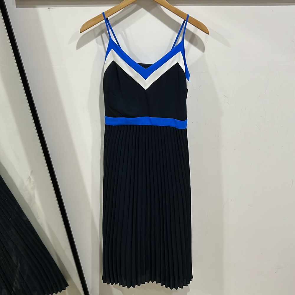 Like new, navy blue Banana Republic dress with pleated skirt